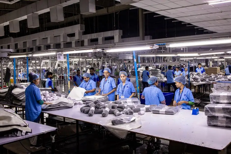 Experienced Custom Uniform Manufacturer professionals at work